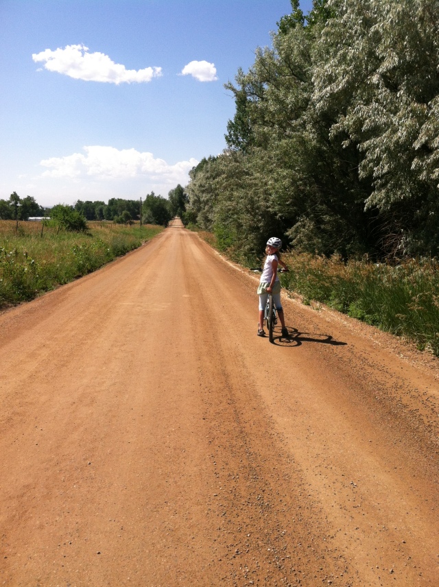 Biking with Lucy on the dirt roads